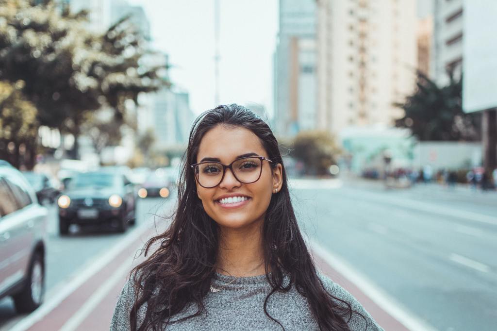 A woman smiling at the camera.