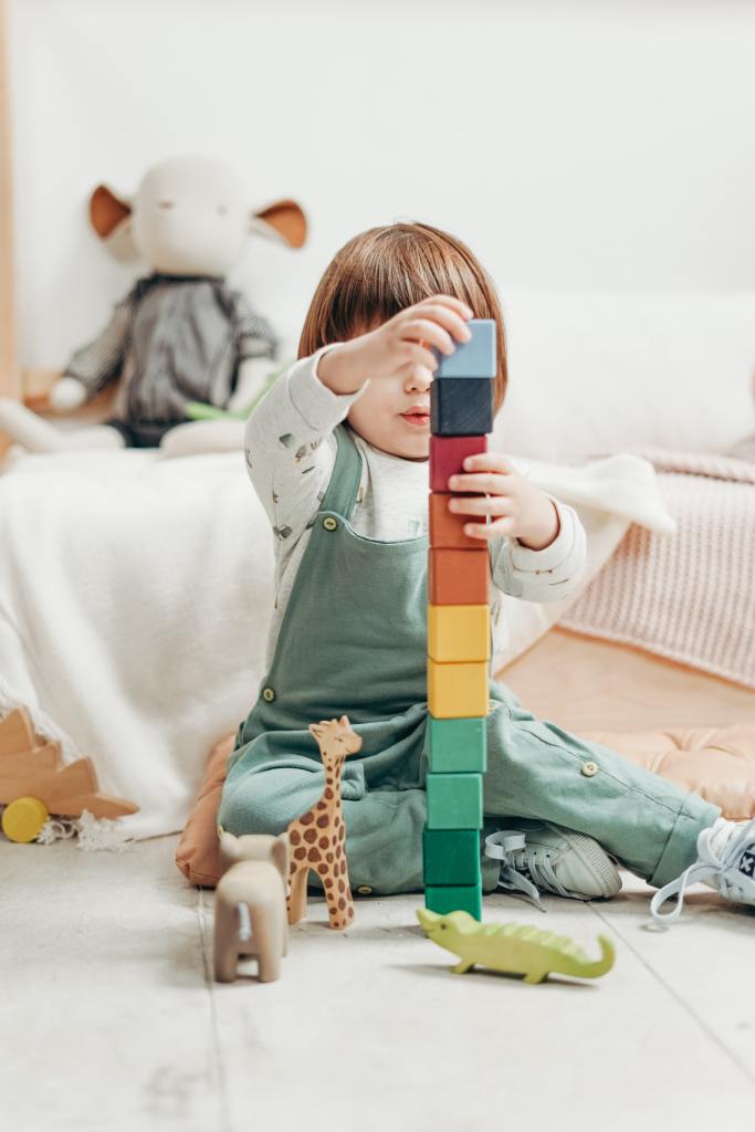 A children playing with blocks.